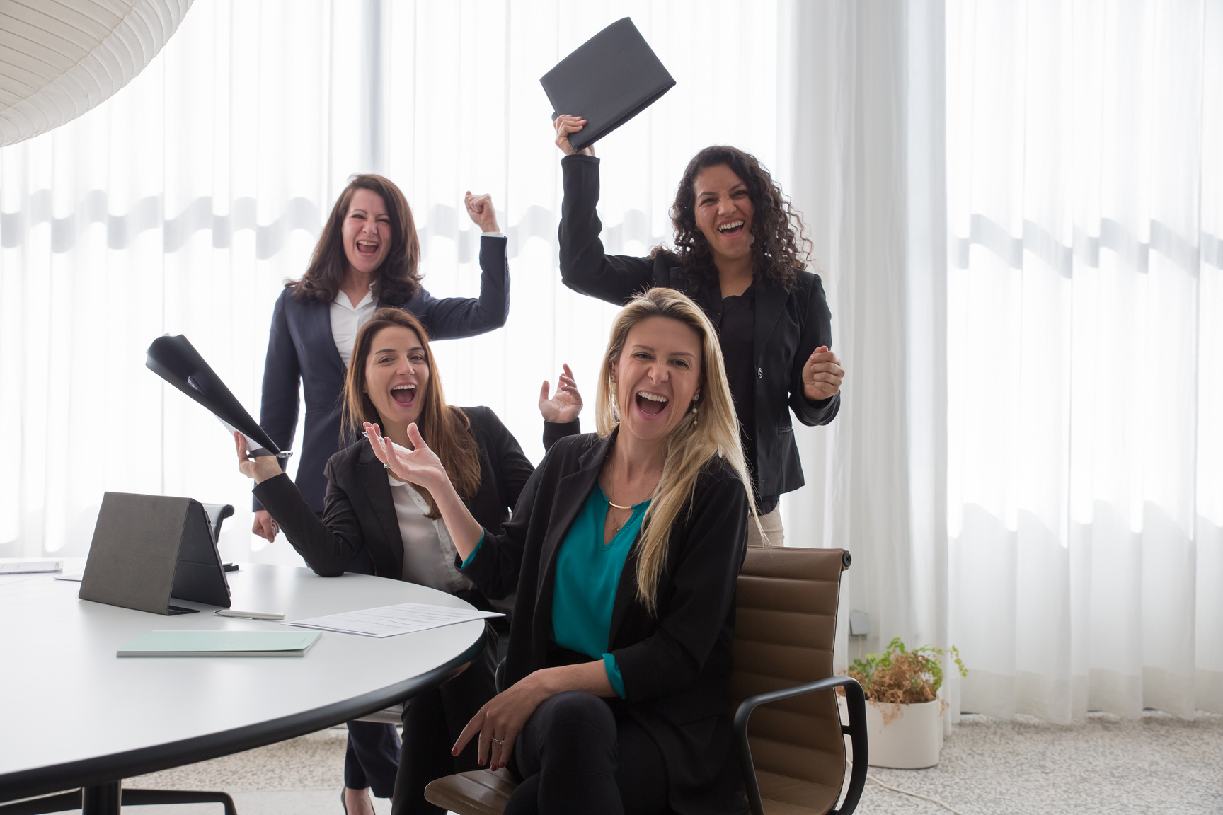 Group of Women Sitting on Chair