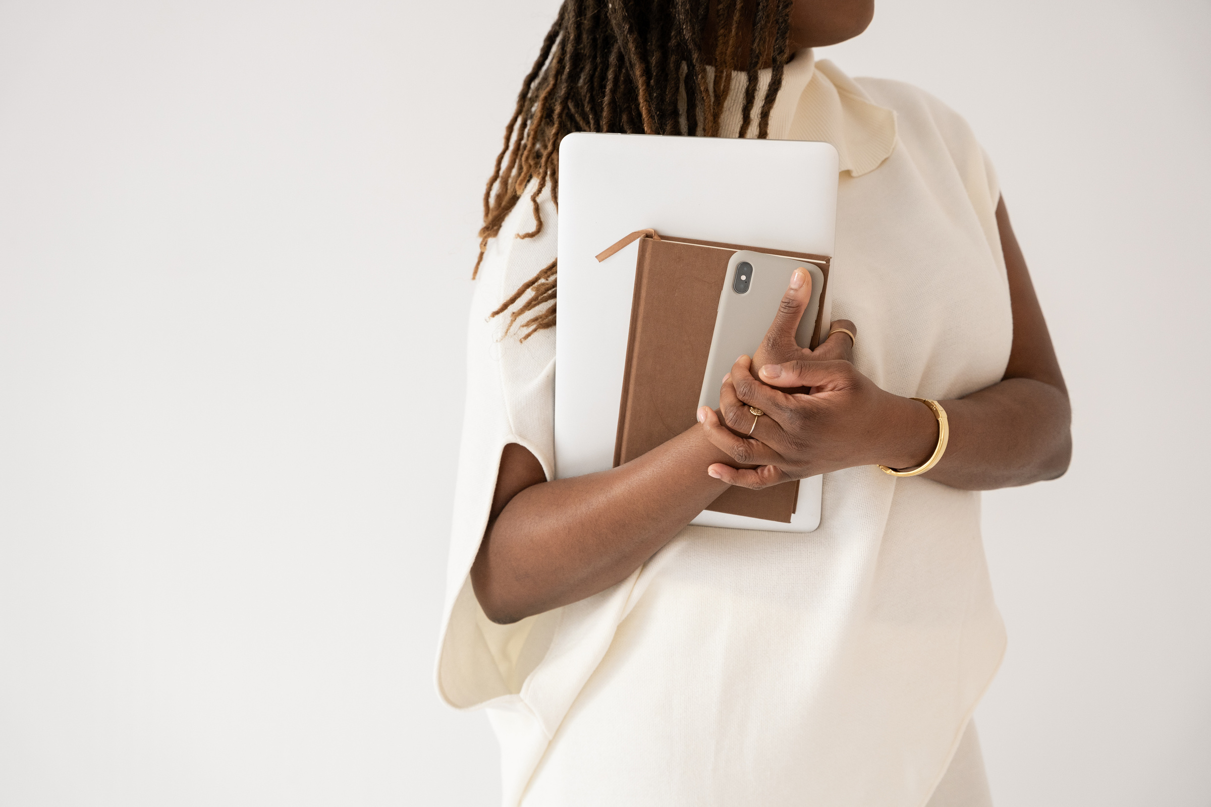 Elegant Office Business Woman Holding Office Supplies
